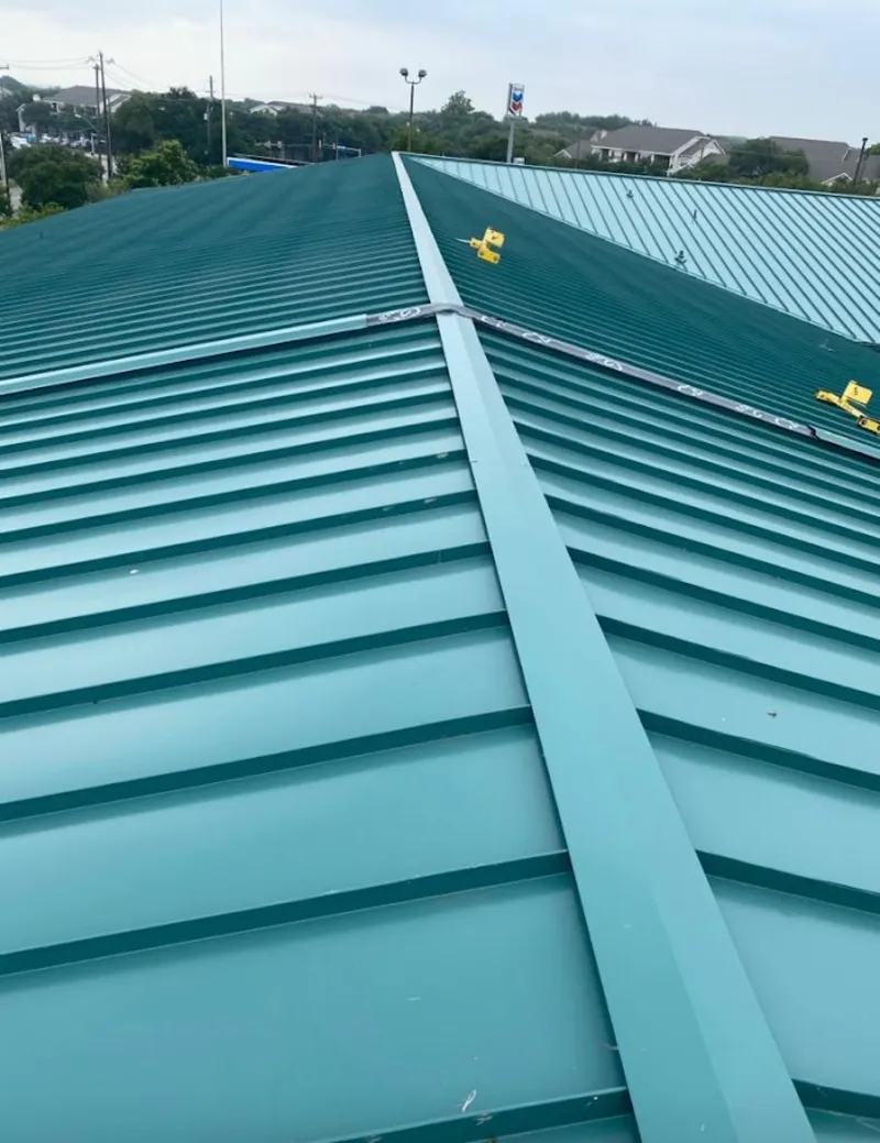 Green commercial metal roof ridge and valley for Metal Roof Repair in Fortuna Foothills