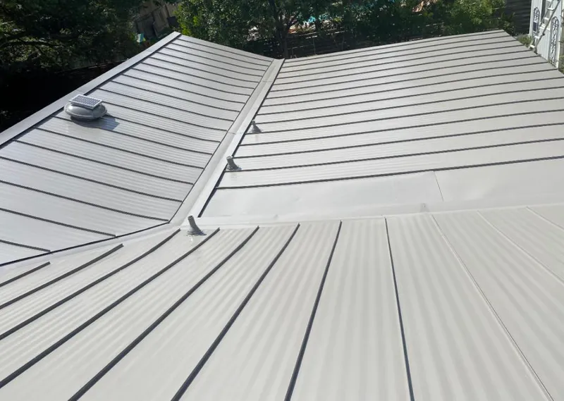 Solar attic fan installed on a metal roof for Roof Ventilation in Fortuna Foothills
